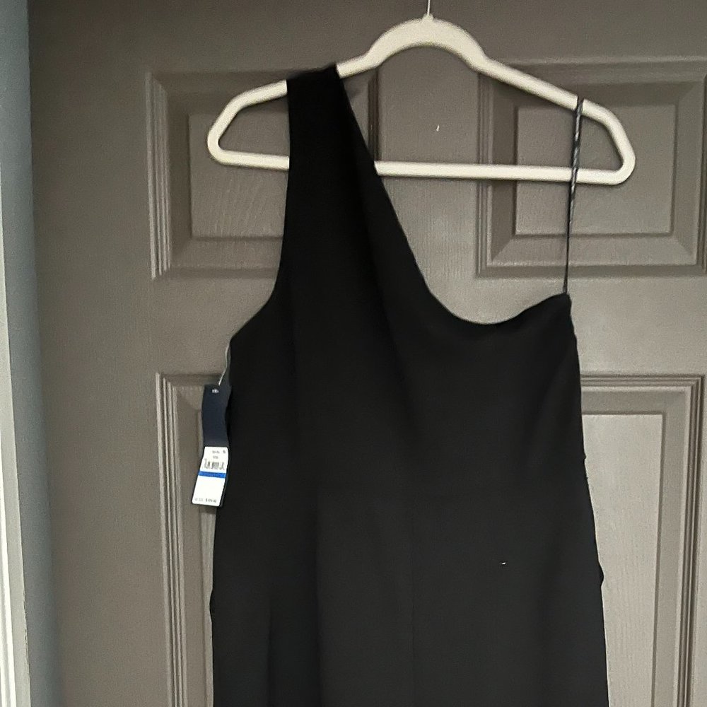 Black Womens  Off the should evening jumpsuit with pockets and a side zipper....